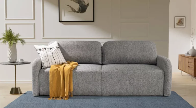 Kanapa rozkładana funkcja spania pojemnik AURA, sofa do pokoju z wygodnym oparciem, poduszkami i wspomaganiem rozkładnia do codziennego spania.